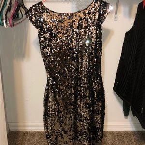 Black and silver sequin dress